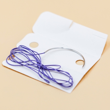 Material de sutura absorbible médico PGLA